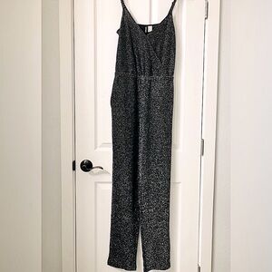 H&M black shimmer Romper. Size 8
Black & Silver